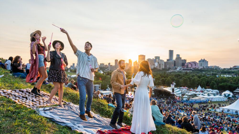 Festival at sunset in front of downtown Edmonton